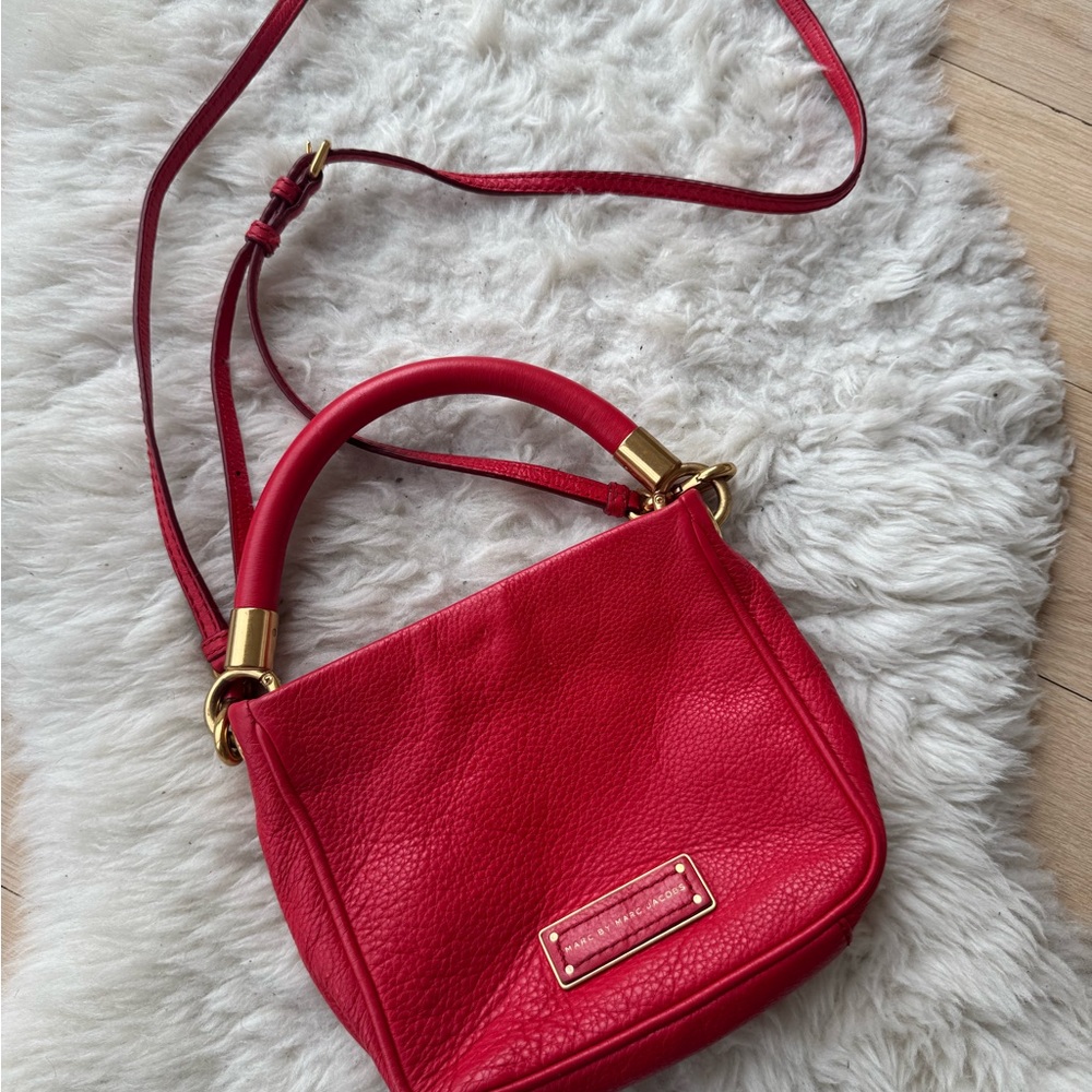 Vibrant Red Crossbody Bag with Gold Hardware and Adjustable Strap
